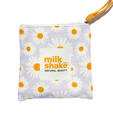 Load image into Gallery viewer, Small pouch with daisy pattern and 'milk shake' branding on a white background