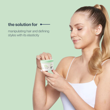 Load image into Gallery viewer, Woman holding a container of milk_shake freehand paste