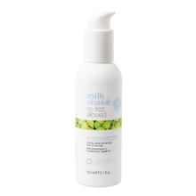 Load image into Gallery viewer, milk_shake no frizz allowed glistening light milk on a white background