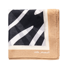 Load image into Gallery viewer, bandana with black, white, and beige design on a white background with milk_shake logo