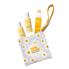 Load image into Gallery viewer, milk_shake hair care products including colour care and incredible milk in a daisy pouch
