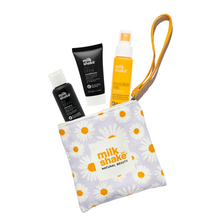 Load image into Gallery viewer, milk_shake hair care products including icy blond and incredible milk in a daisy pouch
