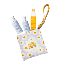 Load image into Gallery viewer, milk_shake hair care products including no frizz allowed and incredible milk in a daisy pouch

