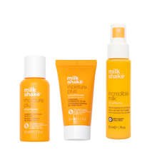 Load image into Gallery viewer, milk_shake moisture plus shampoo and conditioner with incredible milk with a white background
