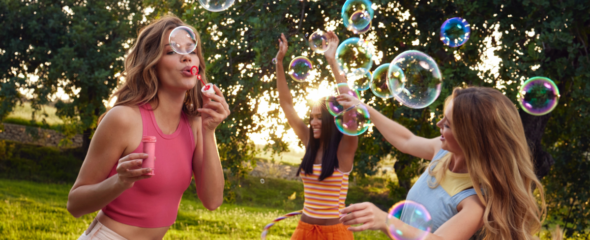 milk_shake models blowing bubbles in a park