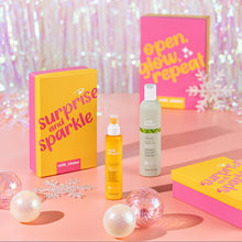 Load image into Gallery viewer, Cosmetic products with &#39;Surprise and Sparkle&#39; and &#39;Open Glow Repeat&#39; text on a pink and white background.
