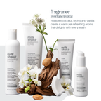 milk_shake everlasting bonds hair care products with flowers and driftwood on a white background