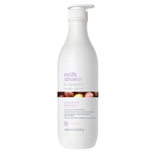 Load image into Gallery viewer, White shampoo bottle with 'milk_shake' branding on a white background
