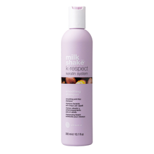 Load image into Gallery viewer, Purple shampoo bottle with 'milk shake' branding on a white background
