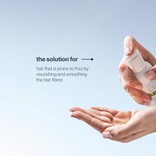 Load image into Gallery viewer, Hand holding a bottle of milk_shake glistening serum with text on a light blue background
