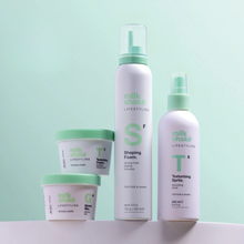Load image into Gallery viewer, Set of milk_shake volumising products with green and white packaging on a light green background.
