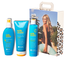 Load image into Gallery viewer, milk_shake sun&amp;more products with a packaging box featuring a model on a white background.
