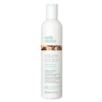 milk_shake  Volume Solution volumizing conditioner bottle on a white background