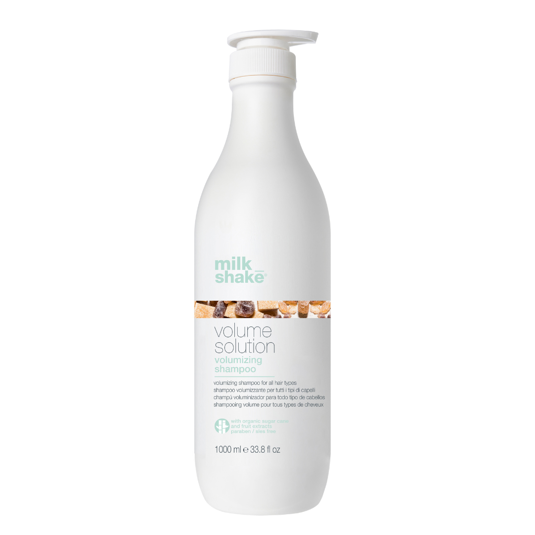 White bottle of milk_shake Volume Solution conditioner on a white background