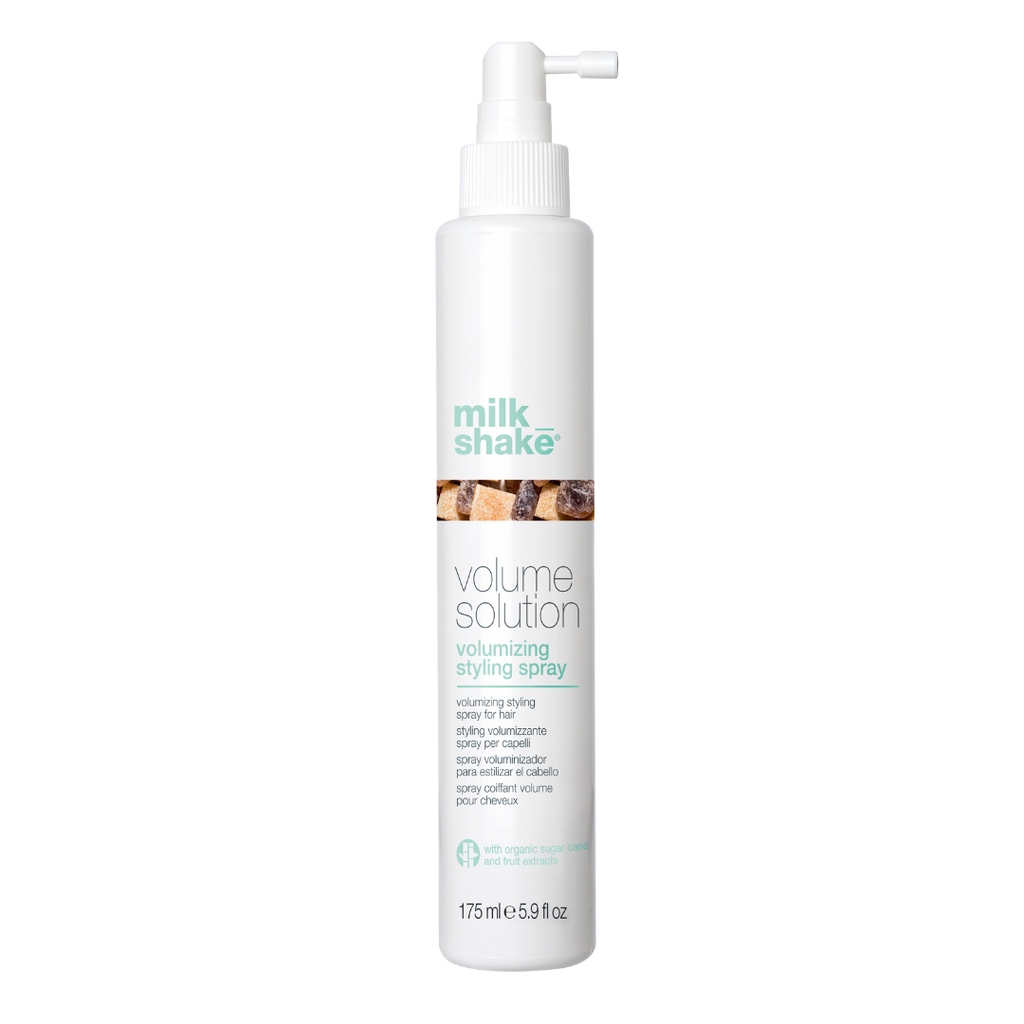 milk_shake  Volume Solution volumizing styling spray bottle on a white background