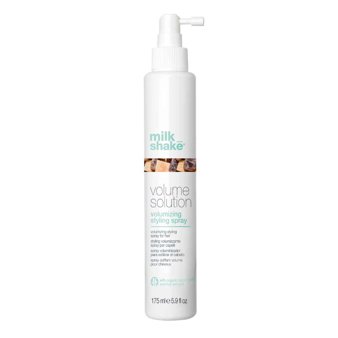 milk_shake  Volume Solution volumizing styling spray bottle on a white background